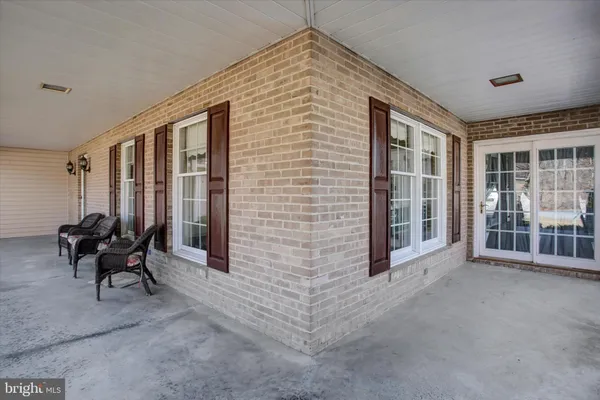 a view of entryway and hall with a window