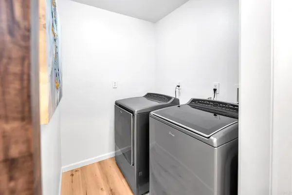a utility room with dryer and washer