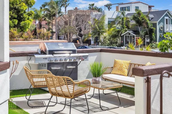 a view of a chairs and table in the terrace