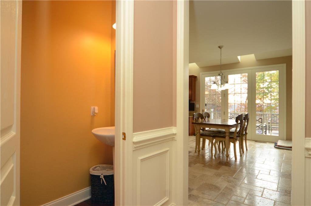 2132 John's Ridge Road Coraopolis, PA 15108 - Photo 11 of 25 This half bath is handy to the entertaining space.