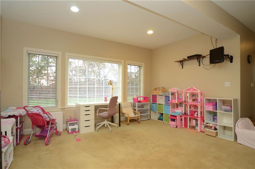 2132 John's Ridge Road Coraopolis, PA 15108 - Photo 19 of 25 Lower level is huge with doors that walk-out to the yard.