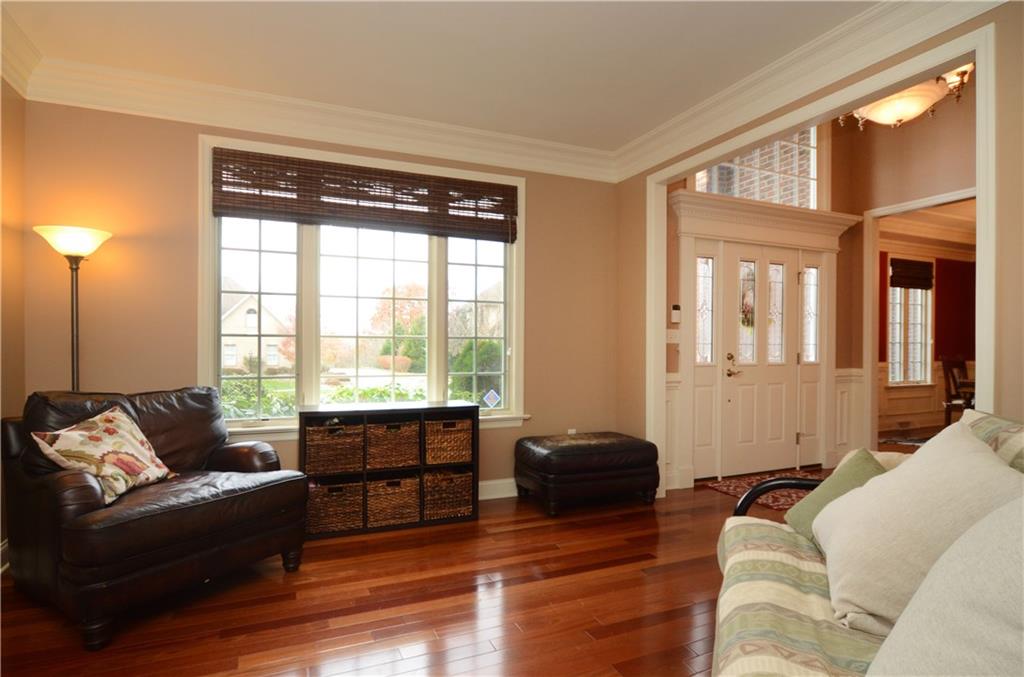 2132 John's Ridge Road Coraopolis, PA 15108 - Photo 4 of 25 Living room is open to the dining room and front entry.