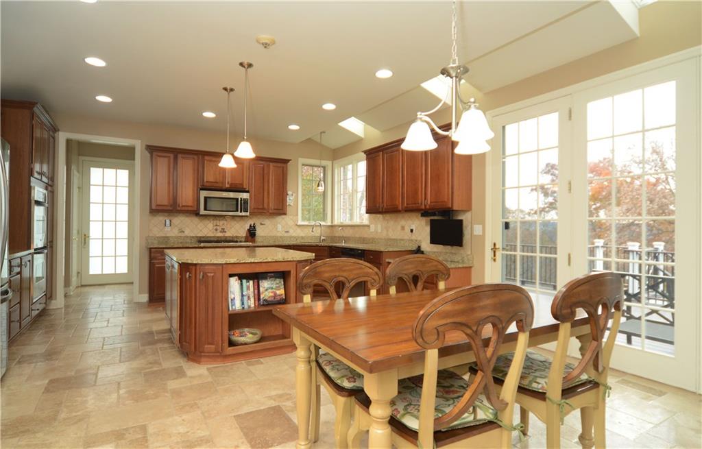 2132 John's Ridge Road Coraopolis, PA 15108 - Photo 5 of 25 Chefs kitchen with large center island and french doors to the oversized deck.