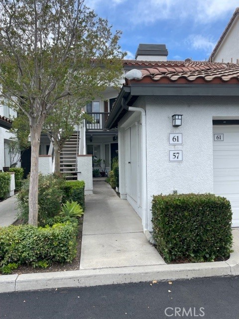 57 Rabano Rancho Santa Margarita, CA 92688 - Photo 19 of 29 a front view of a house with a yard