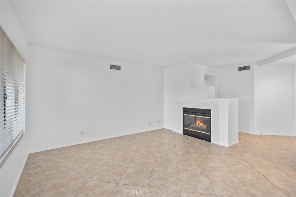 57 Rabano Rancho Santa Margarita, CA 92688 - Photo 4 of 29 a view of a livingroom with a fireplace