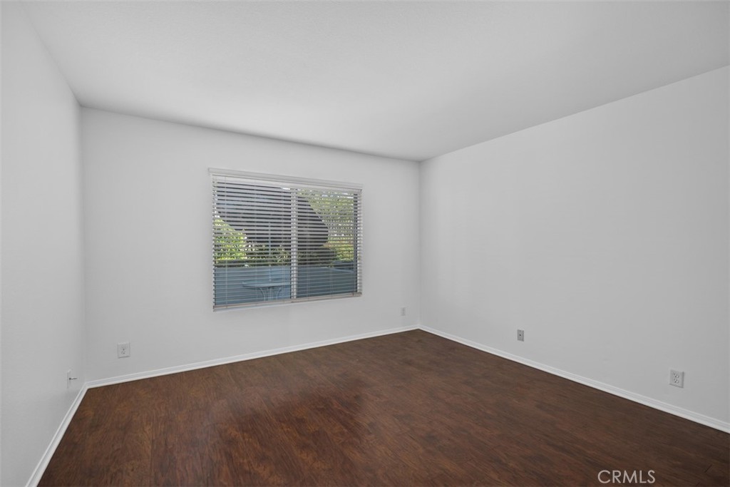 57 Rabano Rancho Santa Margarita, CA 92688 - Photo 9 of 29 an empty room with wooden floor and windows