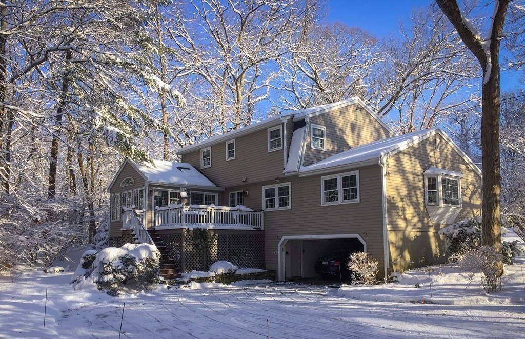83 Concord Road Acton, MA 01720 - Photo 2 of 30 a front view of a house with garden