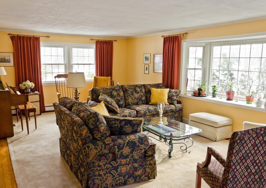 83 Concord Road Acton, MA 01720 - Photo 4 of 30 a living room with furniture and a large window