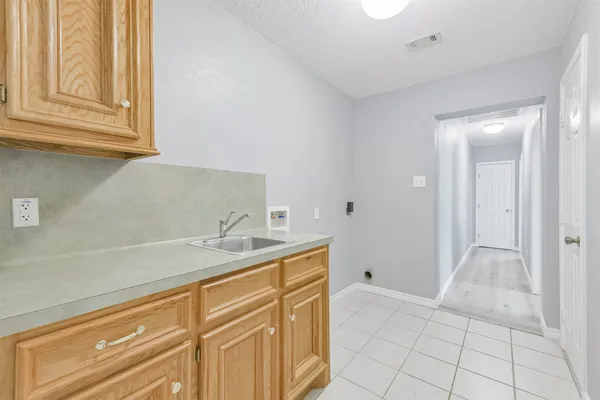 a bathroom with a sink a vanity and mirror
