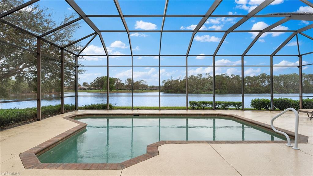 6172 Dogleg Drive Naples, FL 34113 - Photo 13 of 45 a view of a swimming pool