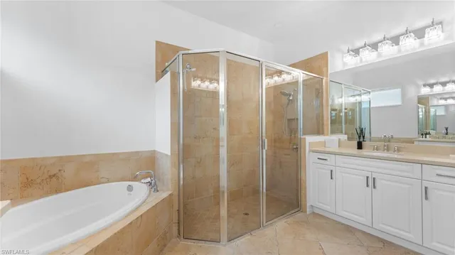 a view of a kitchen with wooden floor and electronic appliances