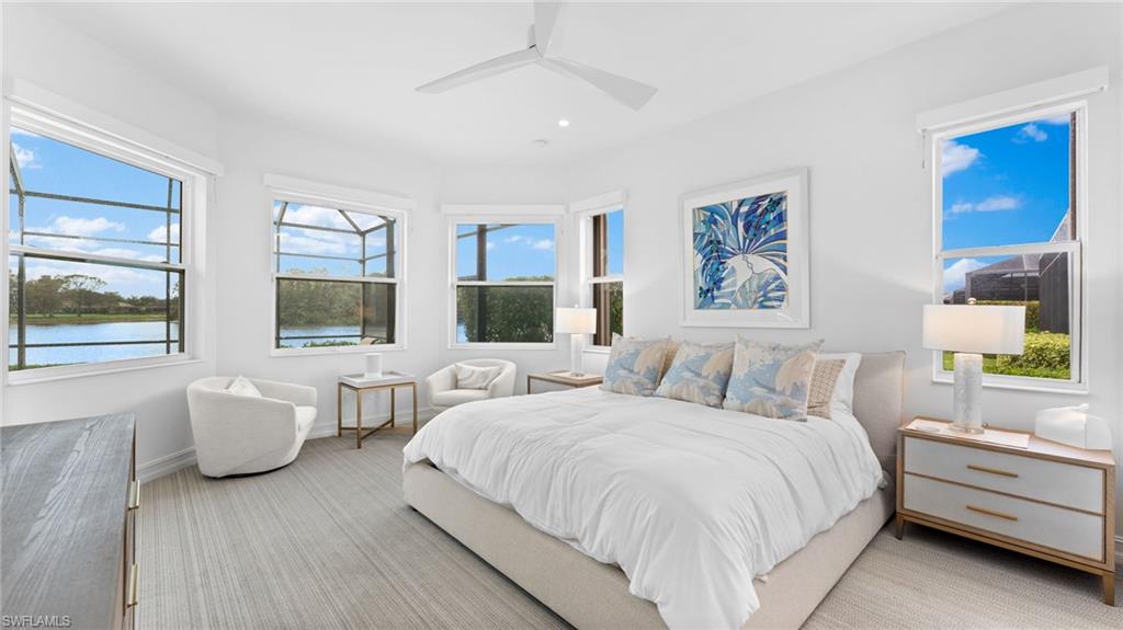 6172 Dogleg Drive Naples, FL 34113 - Photo 38 of 45 a bed room with two bed and a large window