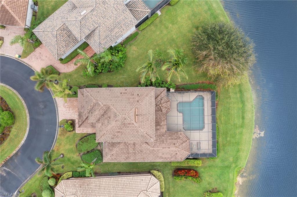 6172 Dogleg Drive Naples, FL 34113 - Photo 8 of 45 an aerial view of a house with a backyard