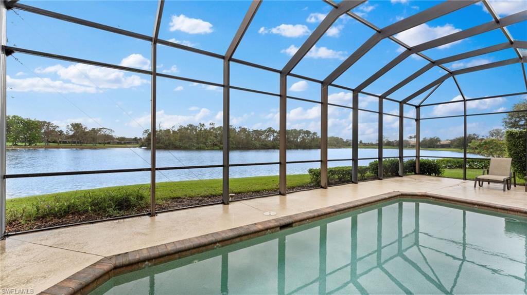 6172 Dogleg Drive Naples, FL 34113 - Photo 9 of 45 a view of a building and window