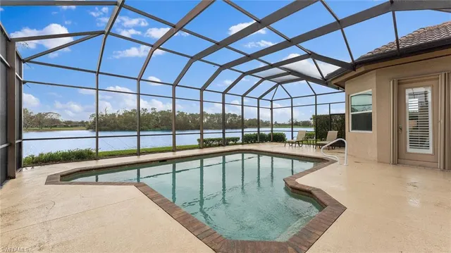 a view of a swimming pool with a porch