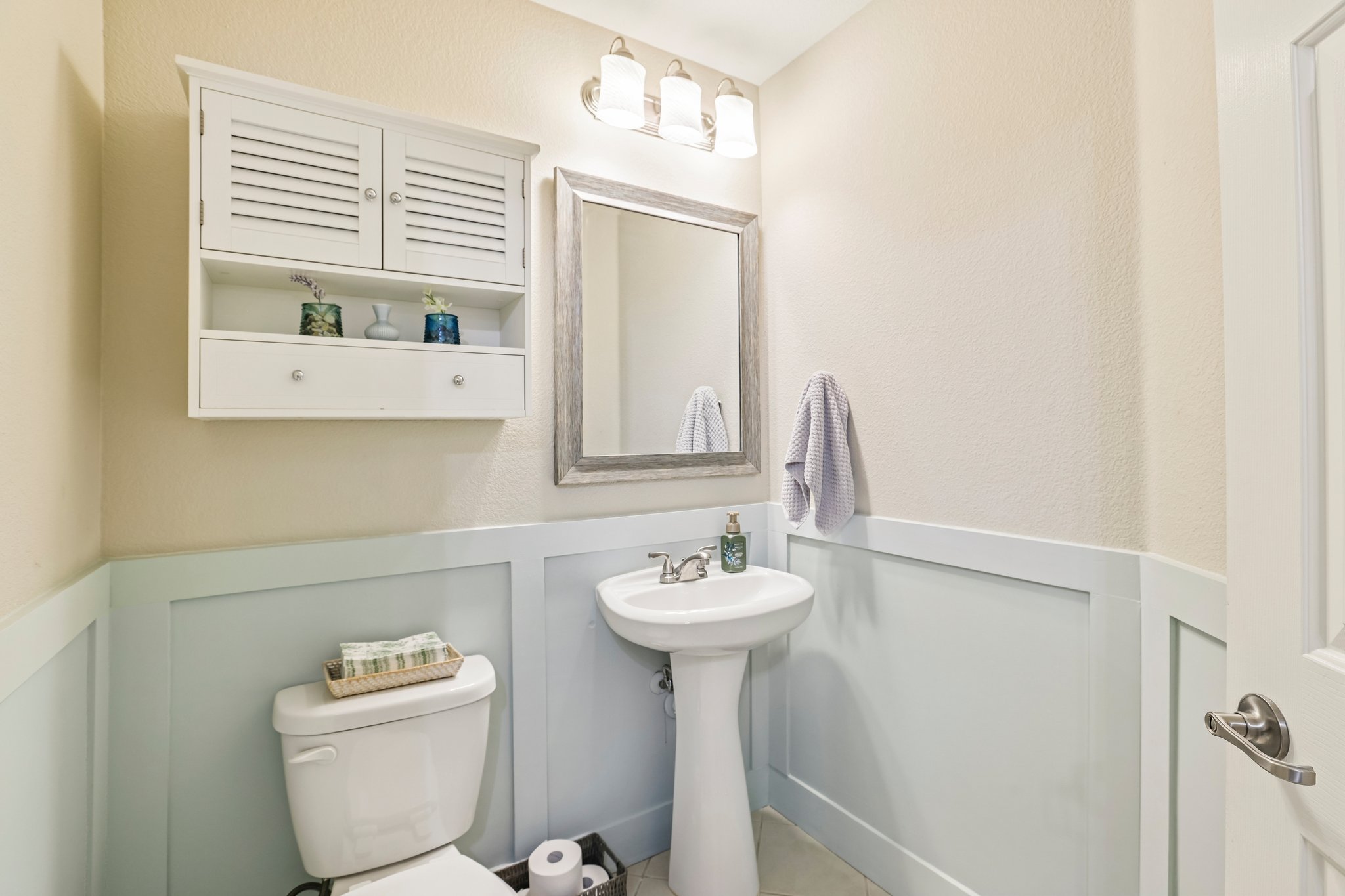 5508 Emma Thompson Way Austin, TX 78747 - Photo 17 of 34 A generously sized downstairs half bath adds both convenience and functionality for guests and everyday living.