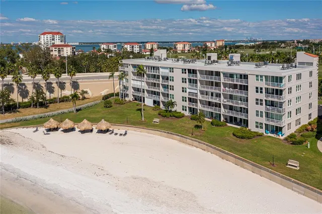 a view of a swimming pool with a yard