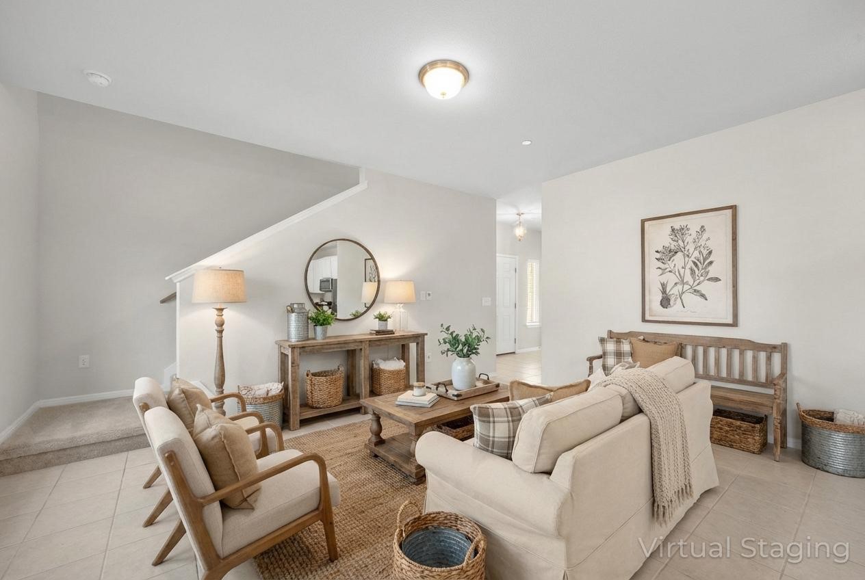 a living room with furniture a fireplace and a table