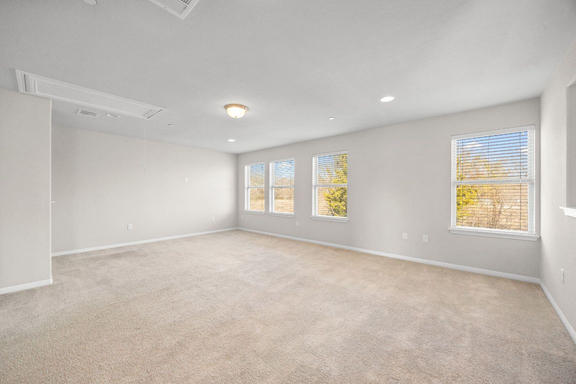 1612 Catalan Road, Unit 201 Austin, TX 78748 - Photo 22 of 35 a view of an empty room with a window