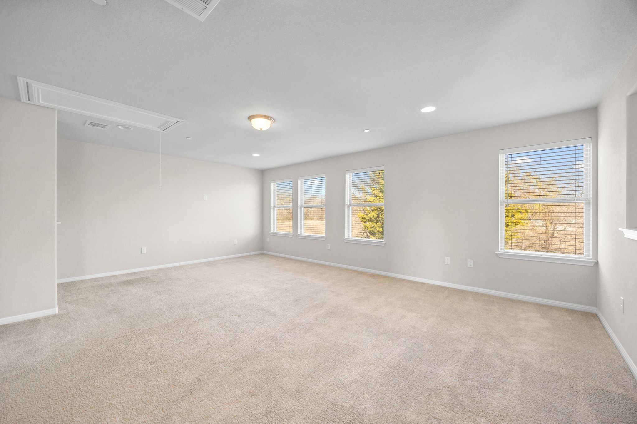1612 Catalan Road, Unit 201 Austin, TX 78748 - Photo 22 of 35 a view of an empty room with a window
