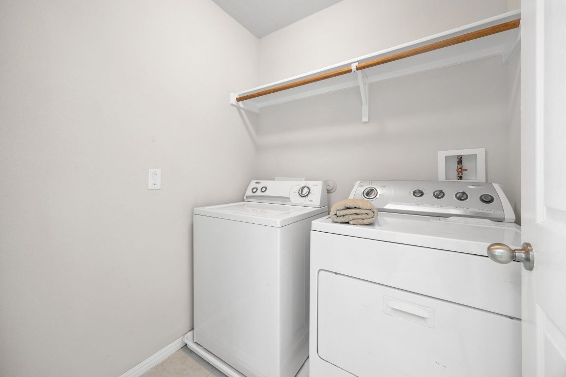1612 Catalan Road, Unit 201 Austin, TX 78748 - Photo 28 of 35 a utility room with dryer and washer
