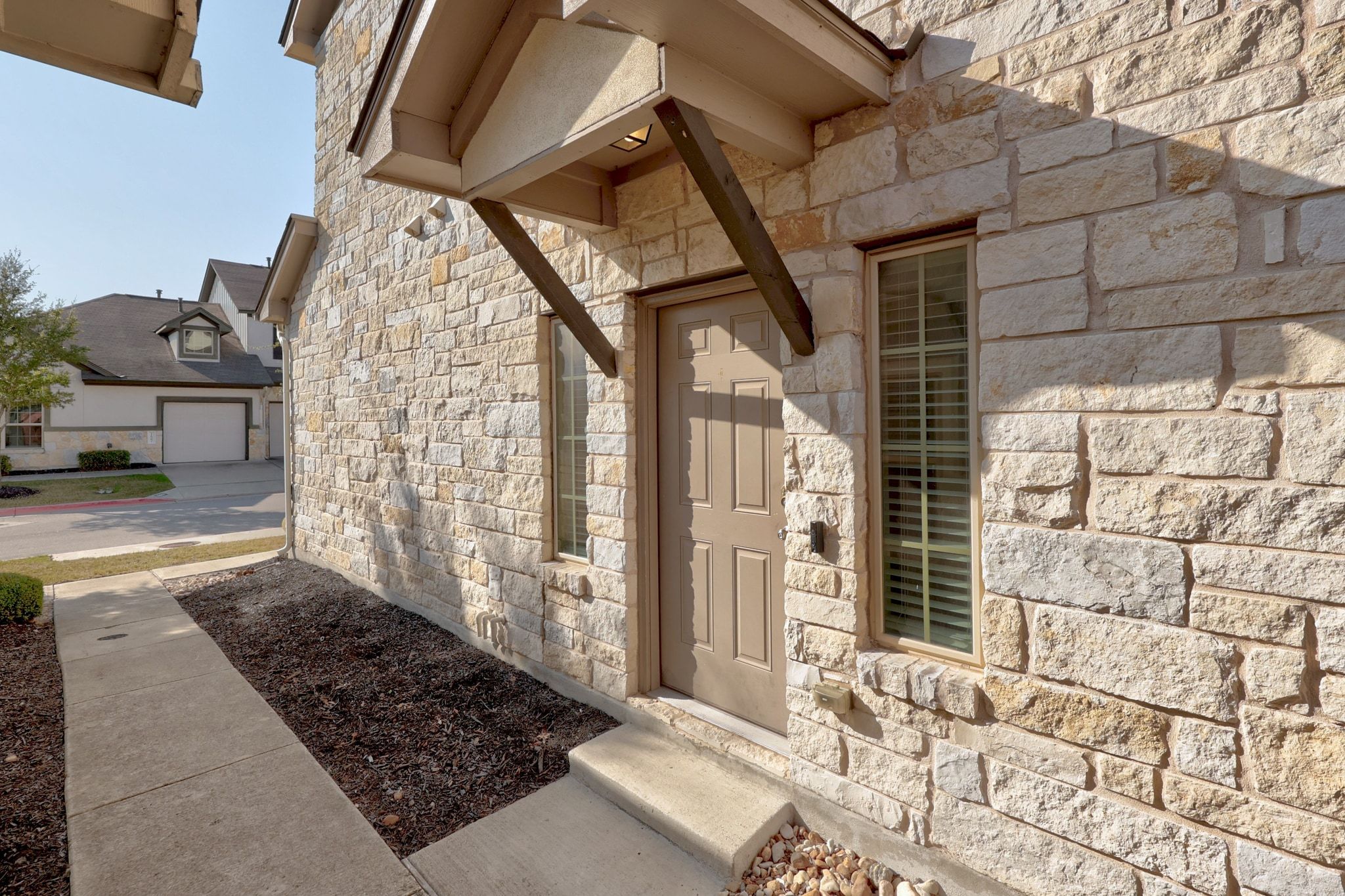 1612 Catalan Road, Unit 201 Austin, TX 78748 - Photo 4 of 35 a view of a entryway door of the house