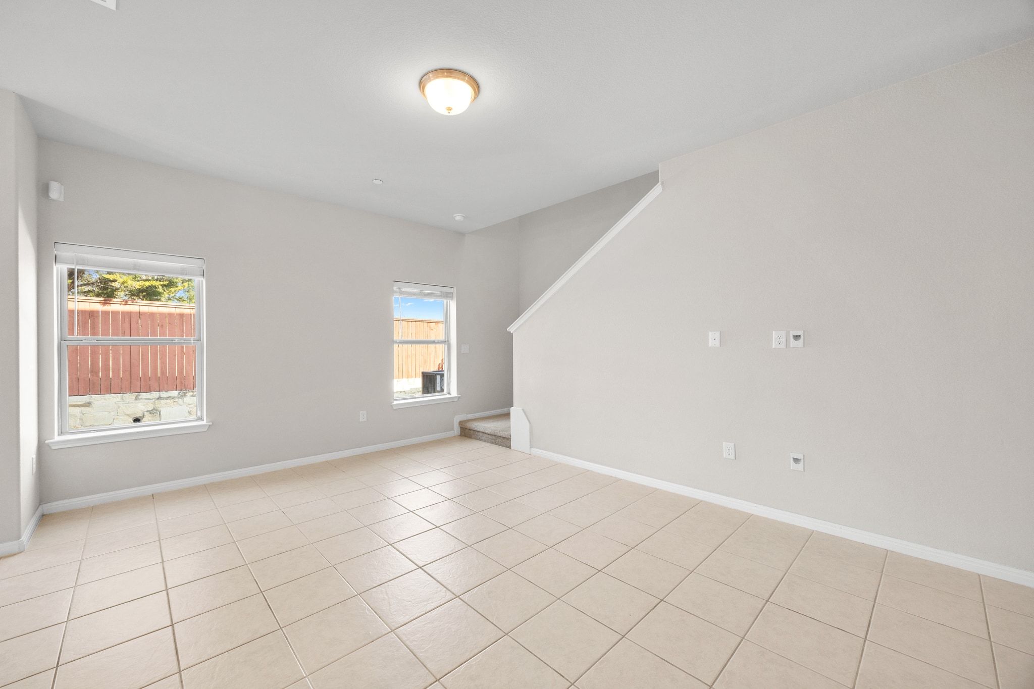 1612 Catalan Road, Unit 201 Austin, TX 78748 - Photo 7 of 35 an empty room with windows