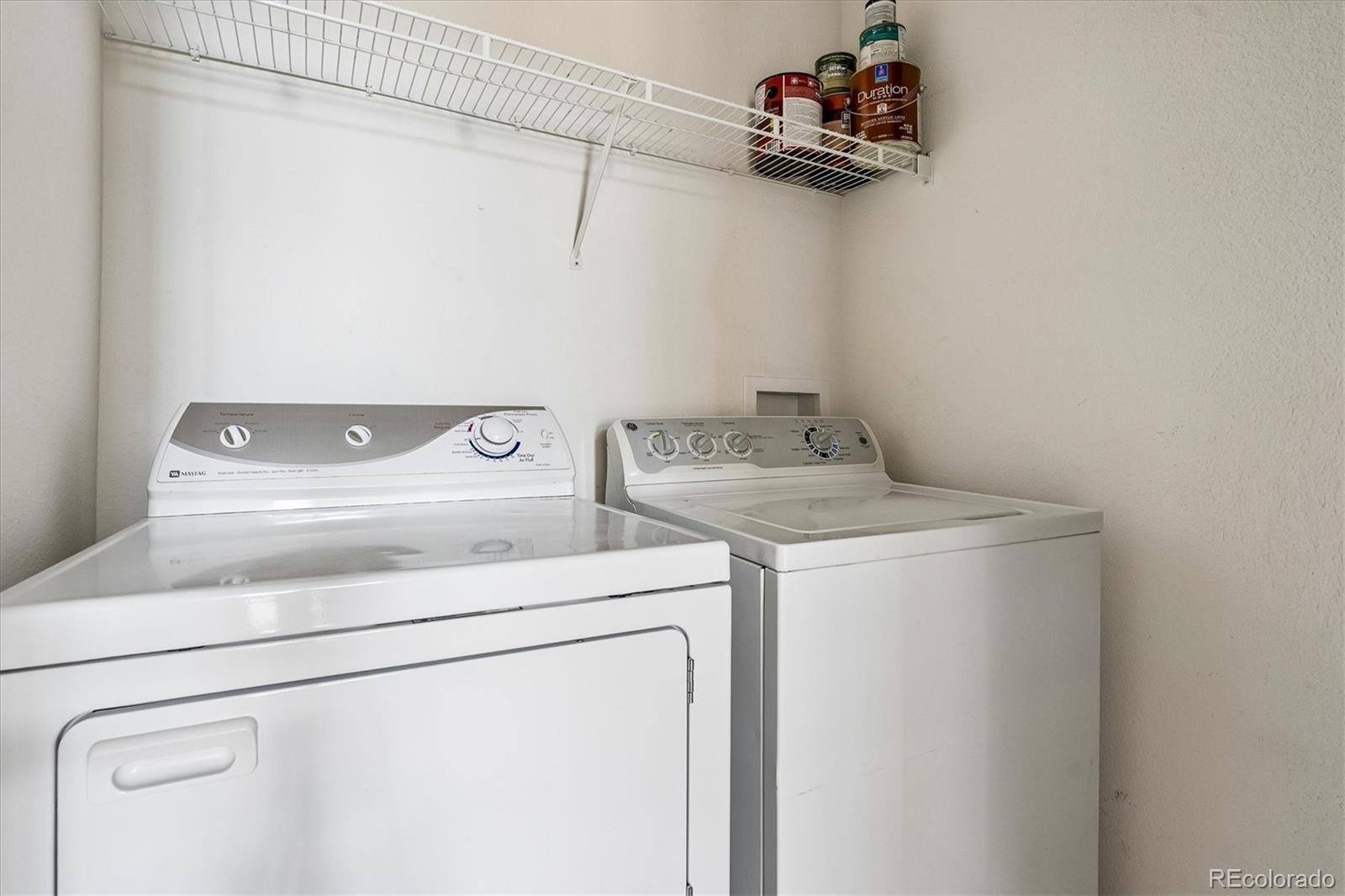 18657 Stroh Road, Unit 4207 Parker, CO 80134 - Photo 13 of 39 a utility room with dryer and washer