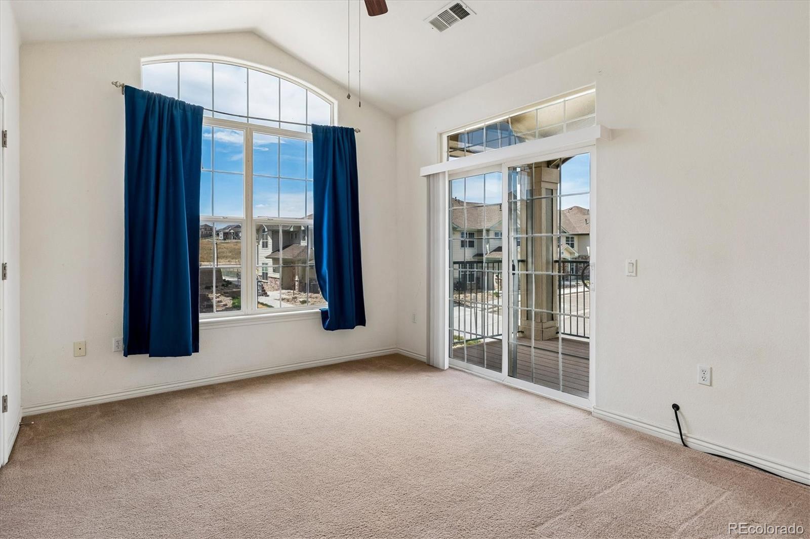18657 Stroh Road, Unit 4207 Parker, CO 80134 - Photo 18 of 39 an empty room with windows