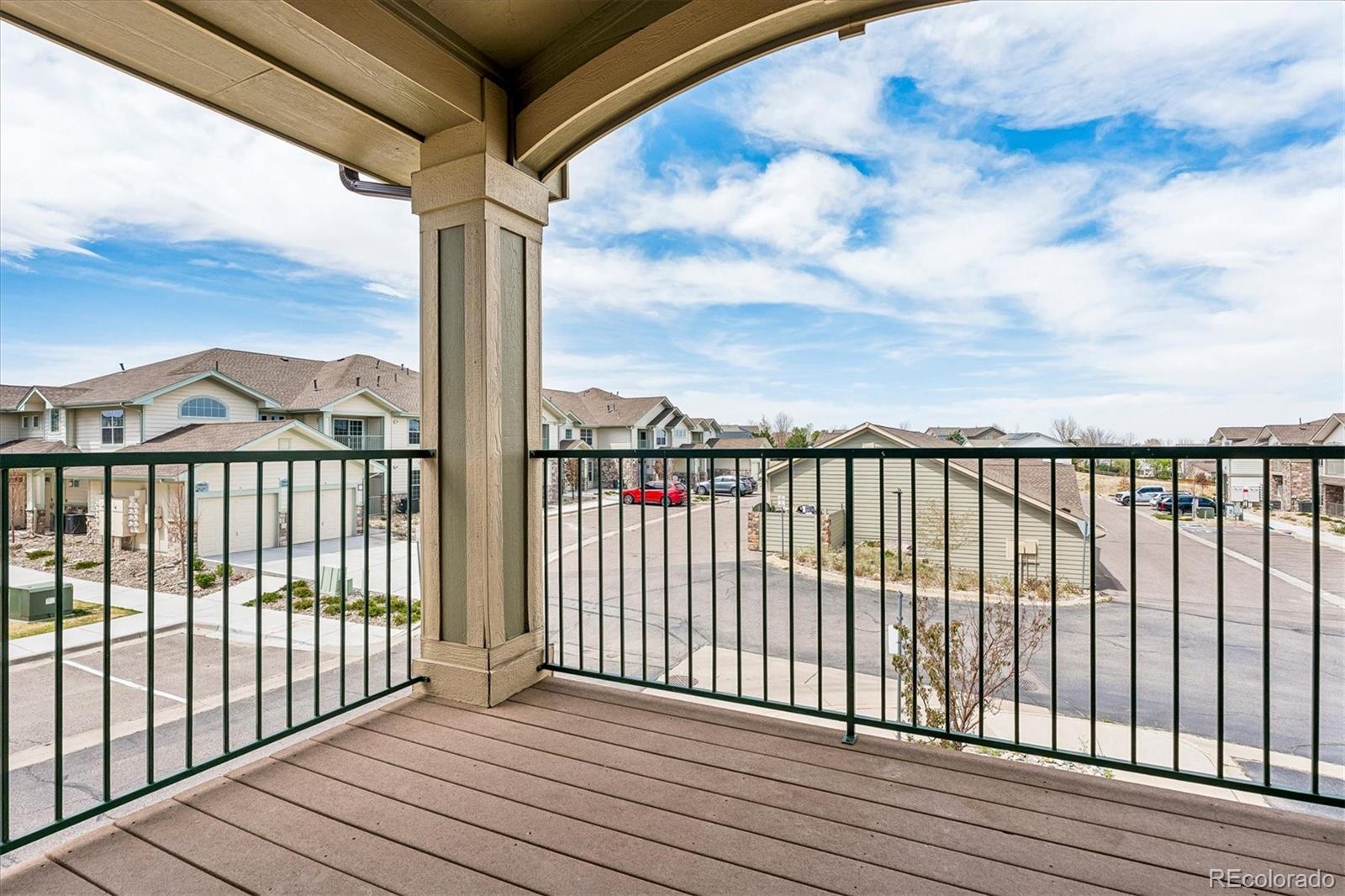 18657 Stroh Road, Unit 4207 Parker, CO 80134 - Photo 19 of 39 a view of a city view from a balcony
