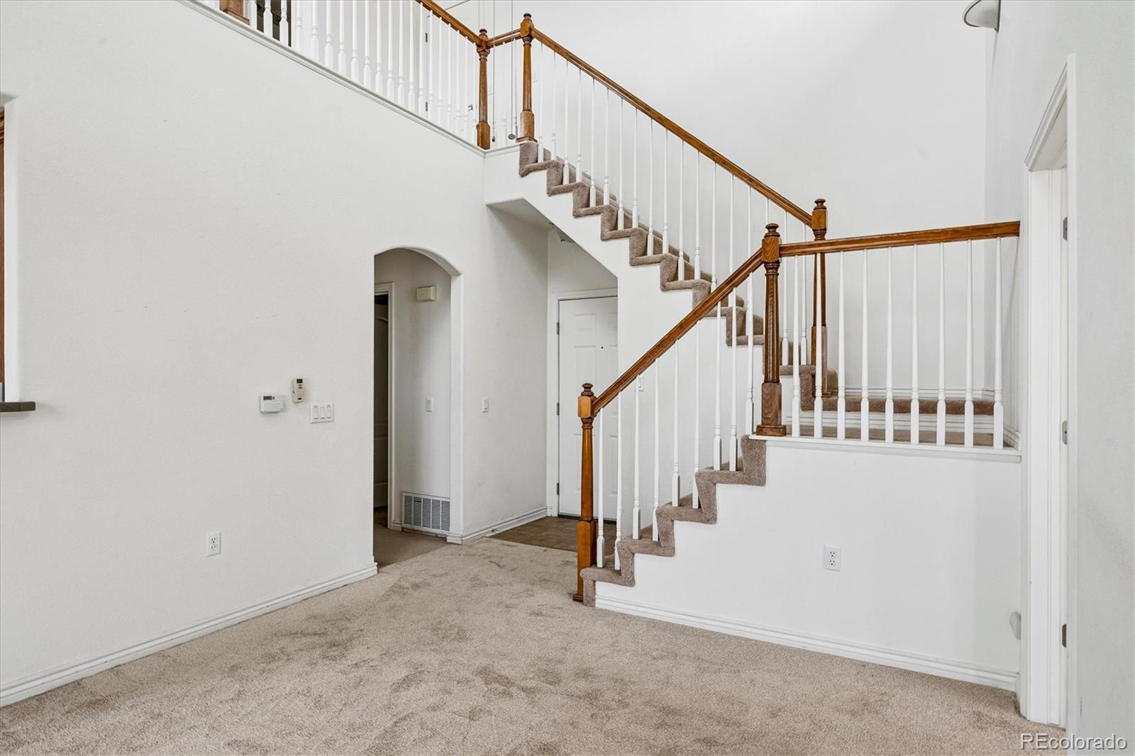 18657 Stroh Road, Unit 4207 Parker, CO 80134 - Photo 22 of 39 a view of entryway with stairs