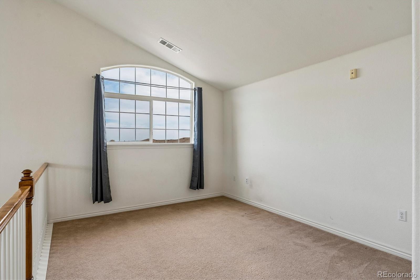 18657 Stroh Road, Unit 4207 Parker, CO 80134 - Photo 24 of 39 an empty room with a window