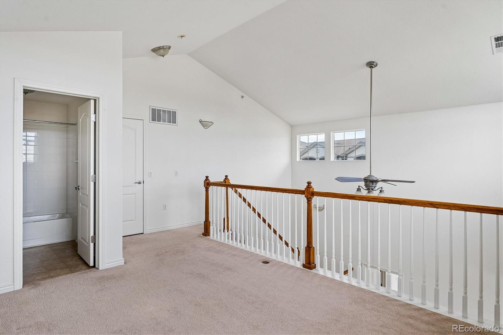 18657 Stroh Road, Unit 4207 Parker, CO 80134 - Photo 25 of 39 a view of a hallway with windows