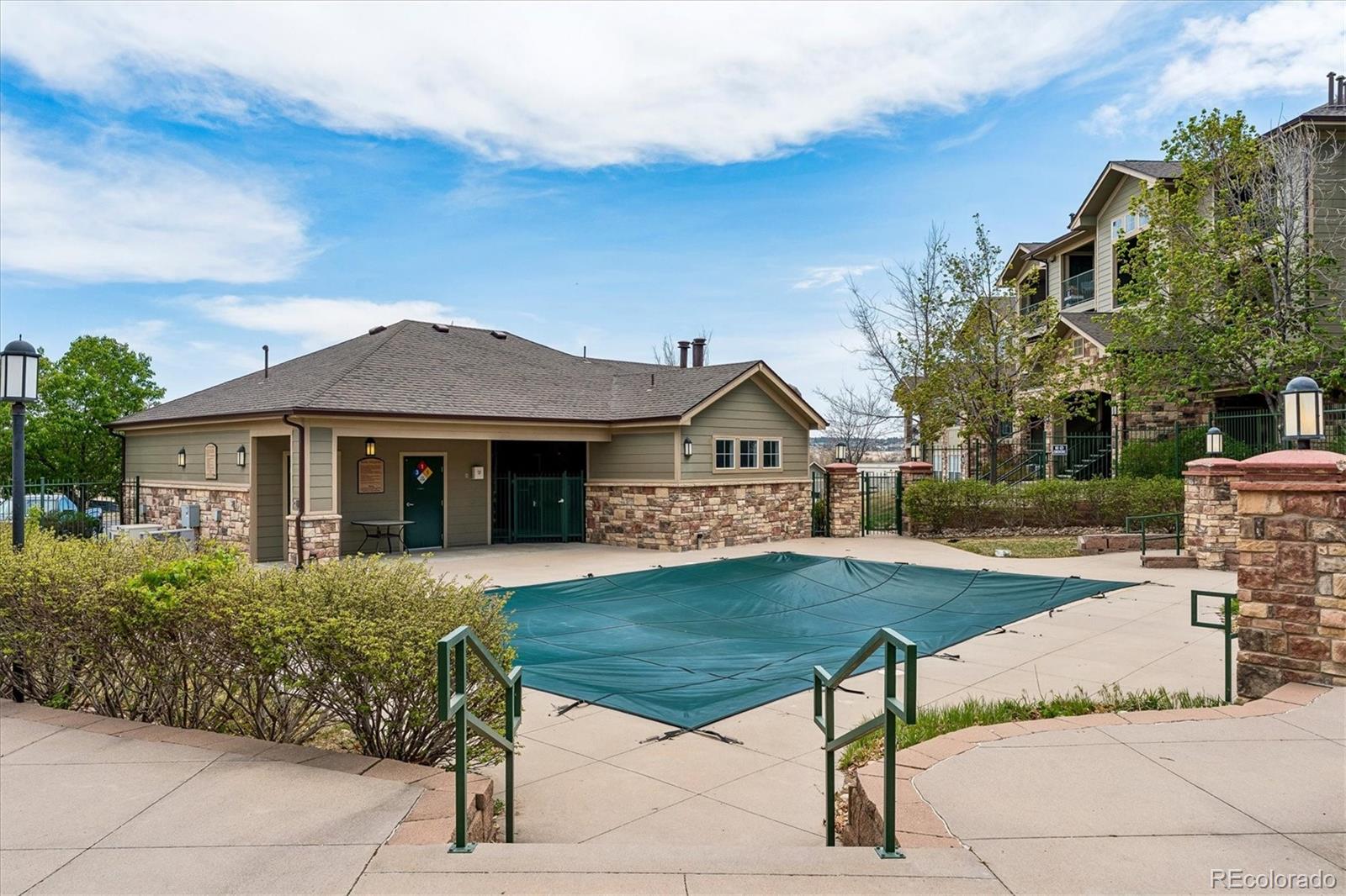 18657 Stroh Road, Unit 4207 Parker, CO 80134 - Photo 30 of 39 a front view of a house with garden