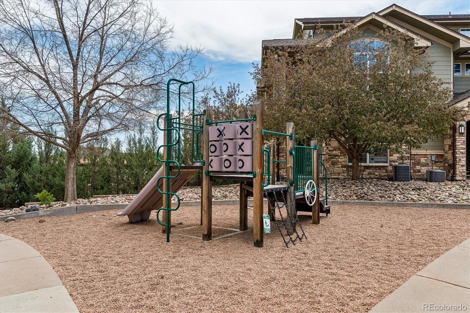 18657 Stroh Road, Unit 4207 Parker, CO 80134 - Photo 31 of 39 a view of a street with benches