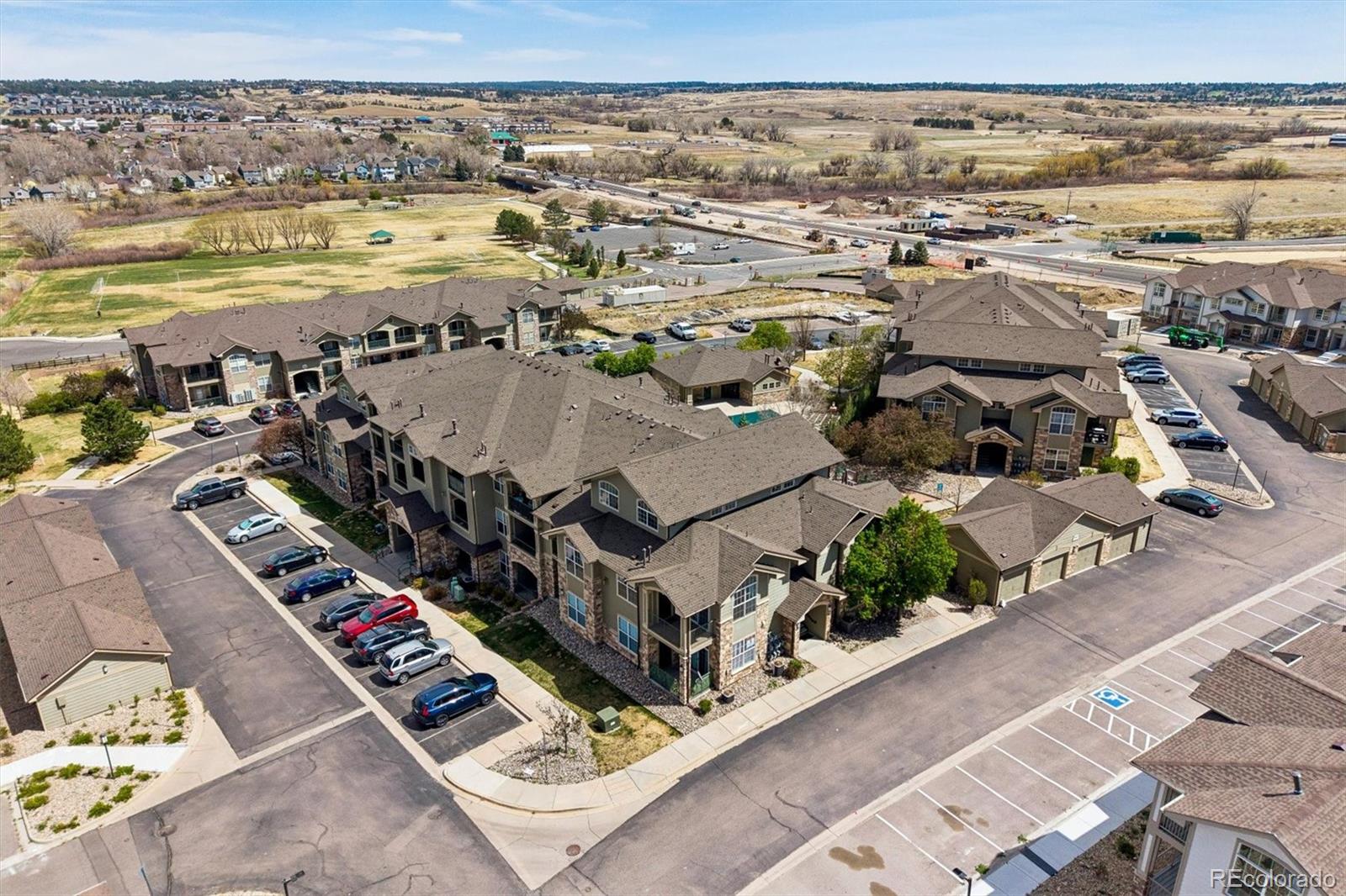 18657 Stroh Road, Unit 4207 Parker, CO 80134 - Photo 33 of 39 an aerial view of residential building and ocean