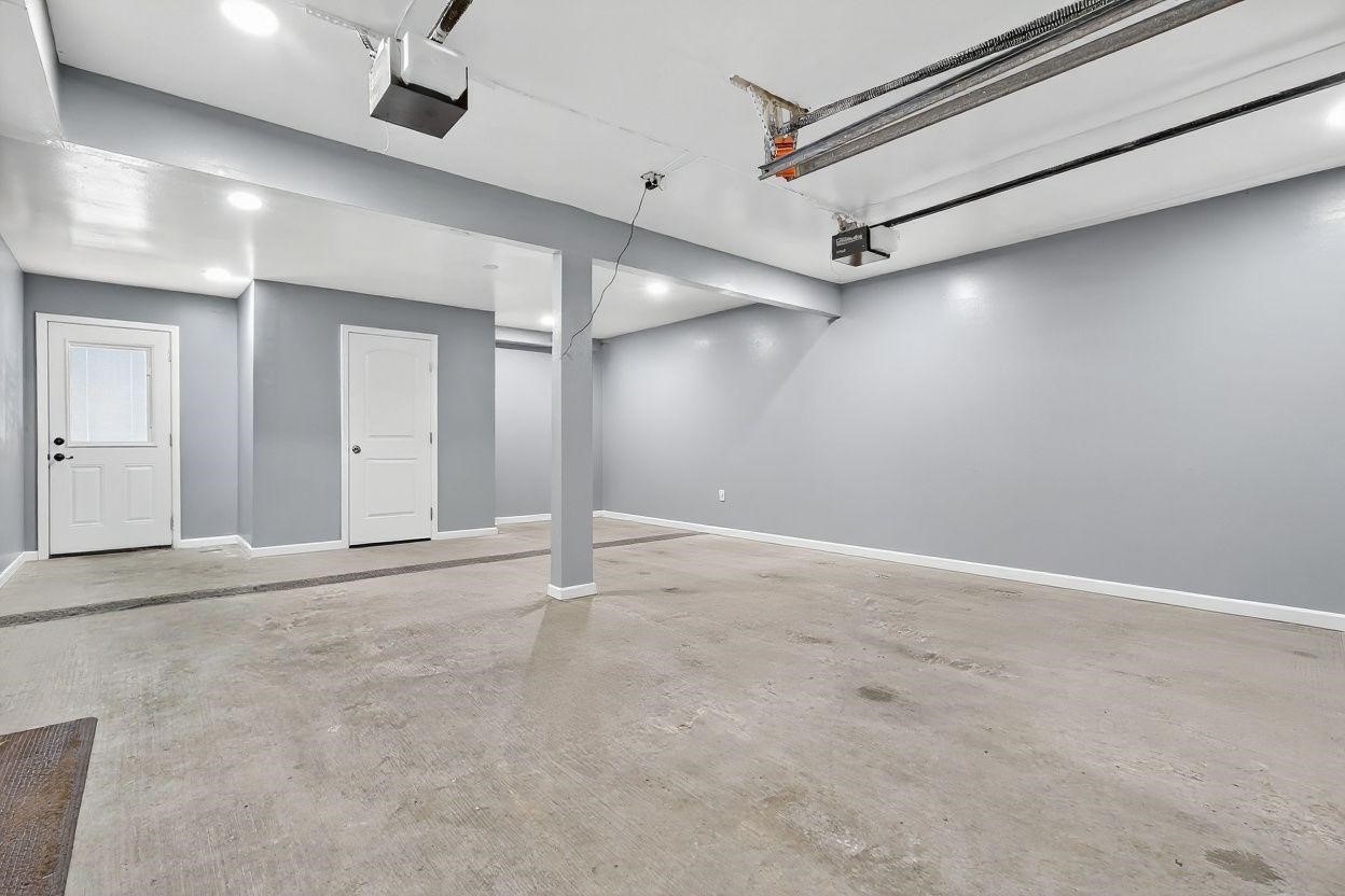 14418 Louetta Road Cypress, TX 77429 - Photo 33 of 39 an empty room with a ceiling fan