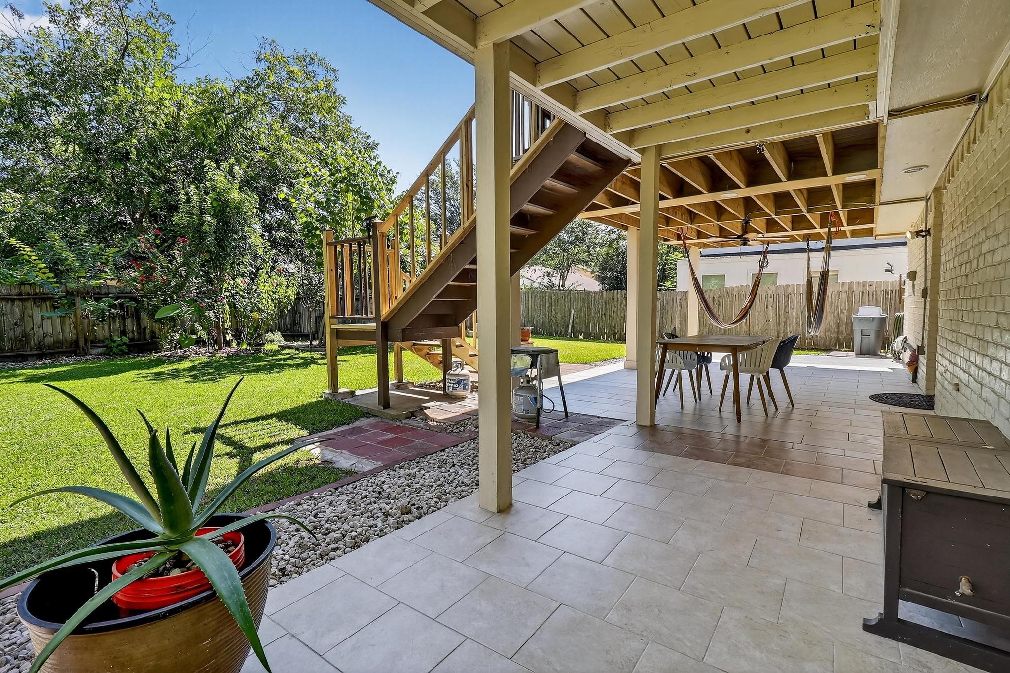 14418 Louetta Road Cypress, TX 77429 - Photo 4 of 39 a view of a swimming pool with a patio