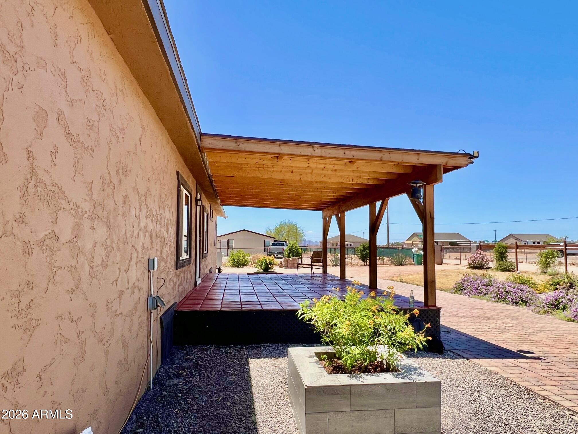 12035 East Tennyson Road Florence, AZ 85132 - Photo 31 of 42 a view of swimming pool with outdoor seating