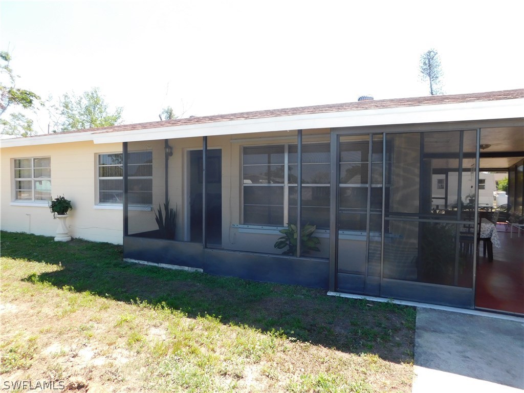 102 Oregon Road West Lehigh Acres, FL 33936 - Photo 2 of 25 a view of outdoor space and yard