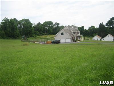 337 Henry Road Nazareth, PA 18064 - Photo 4 of 9 a view of a house with a yard