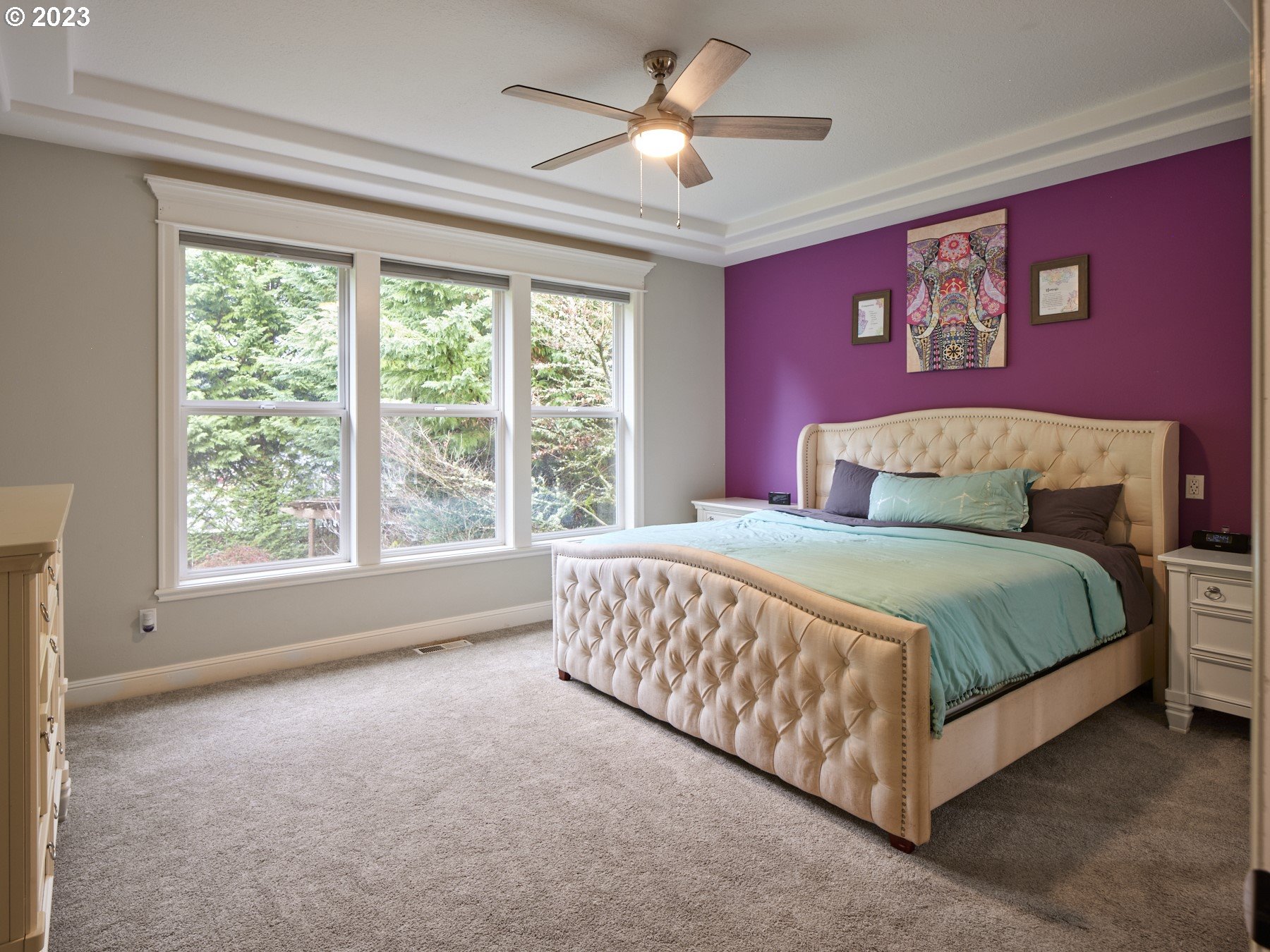3012 Northeast 173rd Street Ridgefield, WA 98642 - Photo 16 of 32 a bedroom with a bed and a large window