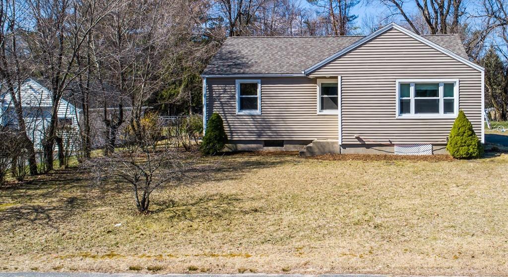 24 Tumbleweed Road Springfield, MA 01109 - Photo 2 of 31 a view of a house with a yard
