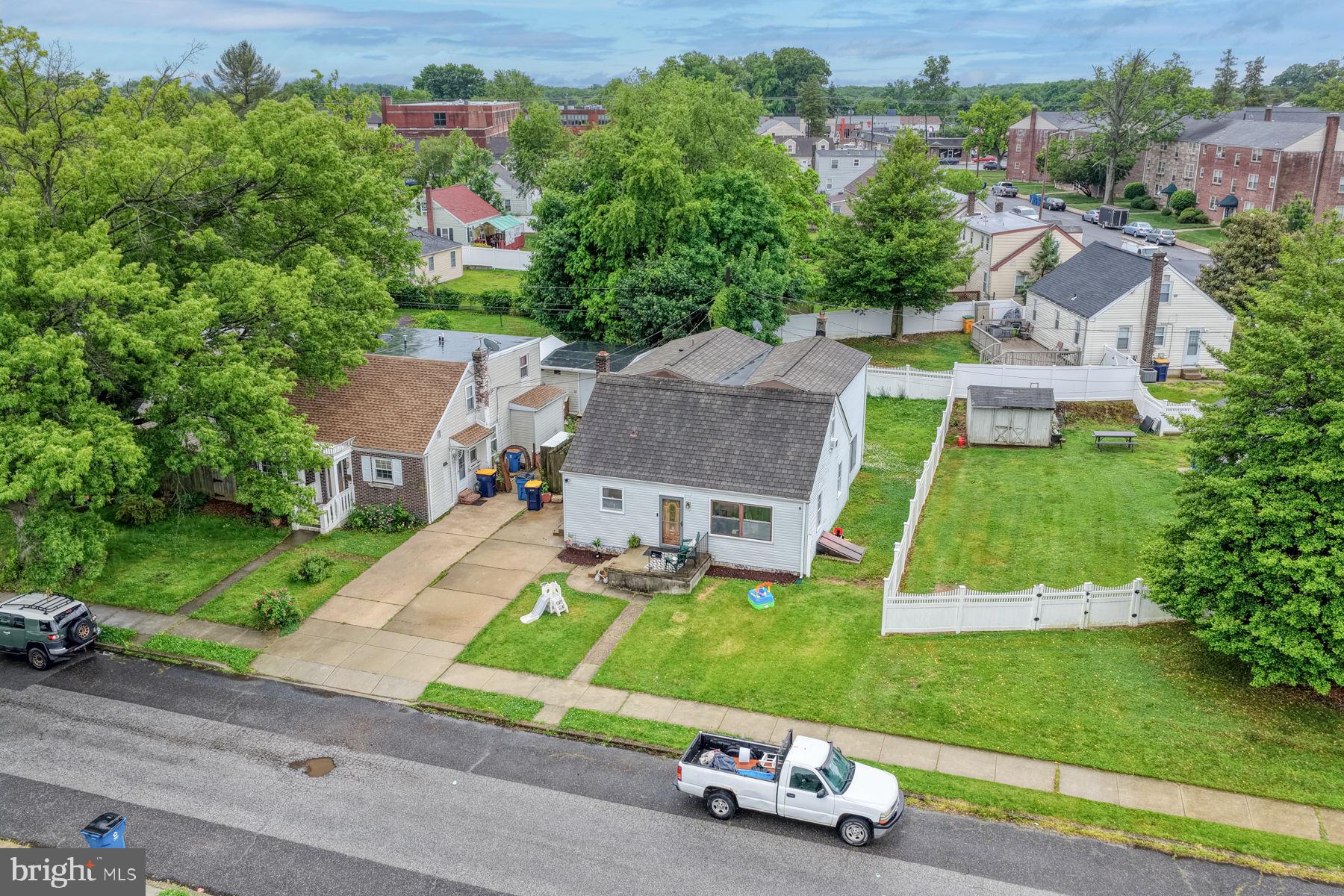 117 Alvil Road Wilmington, DE 19805 - Photo 1 of 41 an aerial view of a house with a garden and parking space