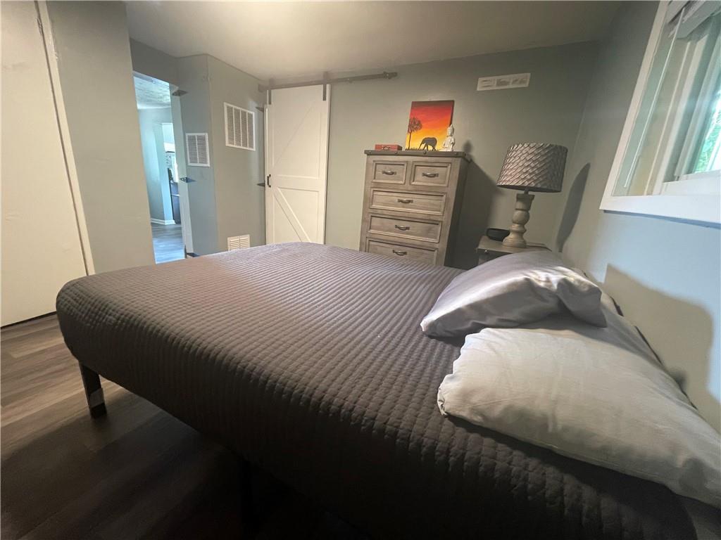 500 7th Avenue Freedom, PA 15042 - Photo 13 of 21 a bedroom with a bed and dresser