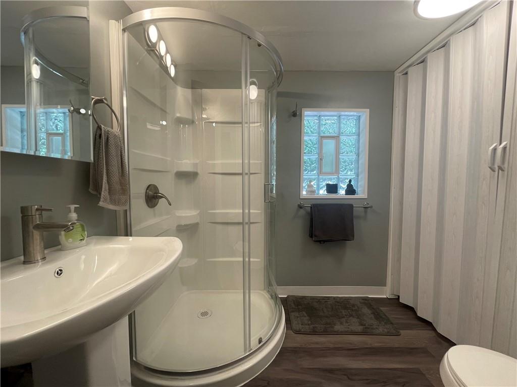 500 7th Avenue Freedom, PA 15042 - Photo 15 of 21 a bathroom with a sink a toilet and shower
