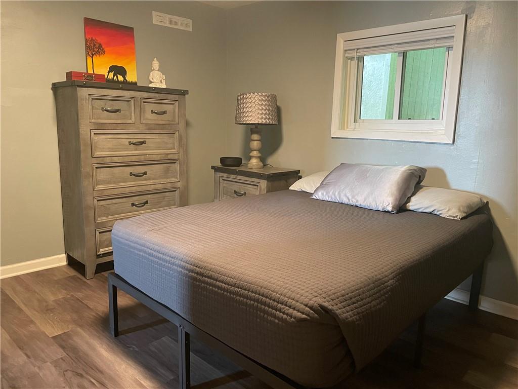 500 7th Avenue Freedom, PA 15042 - Photo 10 of 21 a bedroom with a bed and a window