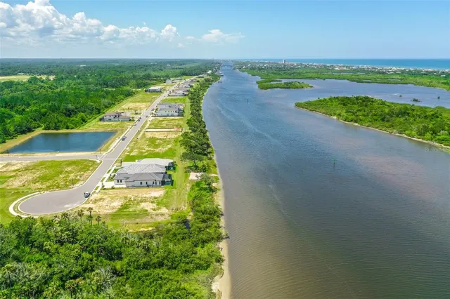 a view of a lake with a big yard