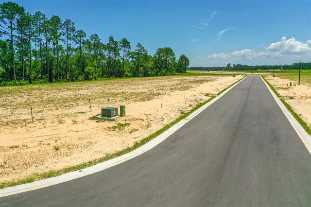 a view of a swimming pool and an outdoor space