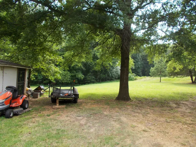a view of a yard with patio